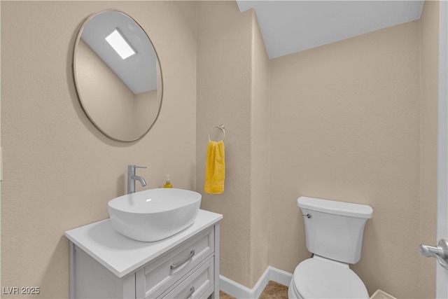 1104 Aspen Cliff Dr, Henderson, NV 89011 - bathroom featuring vanity, toilet, and baseboards