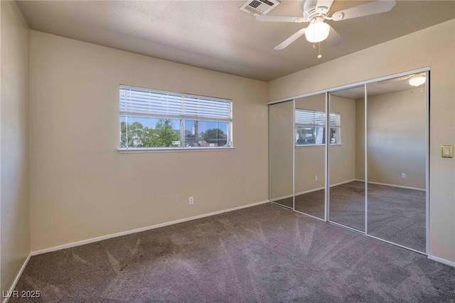 616 Fernbrook Dr, Henderson, NV 89002 - unfurnished bedroom featuring carpet, baseboards, a closet, and a ceiling fan