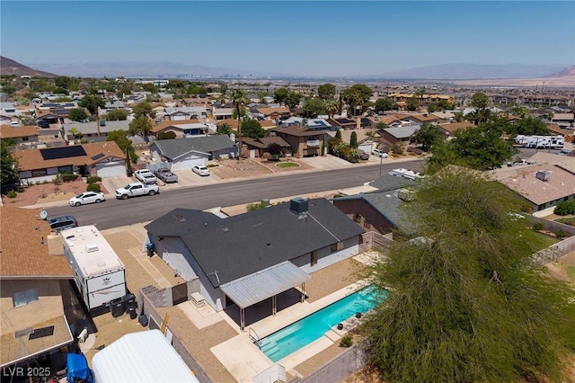 616 Fernbrook Dr, Henderson, NV 89002 - aerial perspective of suburban area with a mountain backdrop and a pool area
