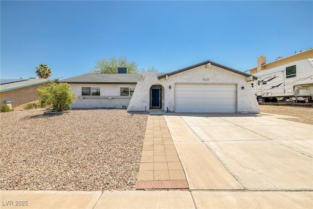 616 Fernbrook Dr, Henderson, NV 89002 - ranch-style house with stucco siding, an attached garage, and concrete driveway