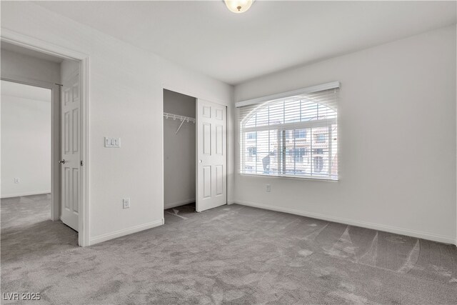 5661 Brimstone Hill Ave, Las Vegas, NV 89141 - unfurnished bedroom with carpet, a closet, and baseboards