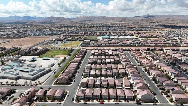 5661 Brimstone Hill Ave, Las Vegas, NV 89141 - aerial view of property and surrounding area featuring mountains and nearby suburban area