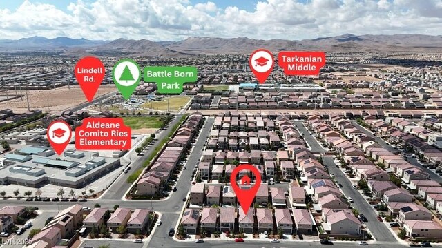 5661 Brimstone Hill Ave, Las Vegas, NV 89141 - aerial view of residential area featuring a mountain backdrop