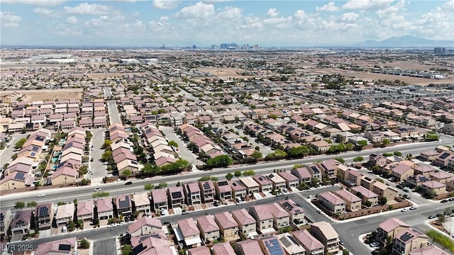 5661 Brimstone Hill Ave, Las Vegas, NV 89141 - aerial view of property and surrounding area featuring nearby suburban area and a mountainous background