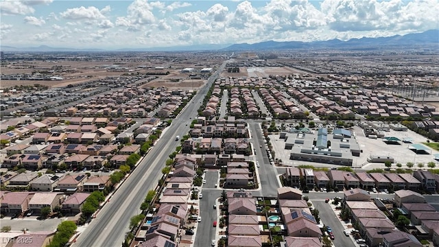 5661 Brimstone Hill Ave, Las Vegas, NV 89141 - aerial perspective of suburban area featuring a mountainous background