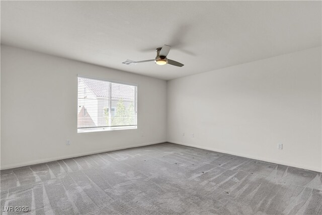 5661 Brimstone Hill Ave, Las Vegas, NV 89141 - spare room with ceiling fan, carpet flooring, and baseboards