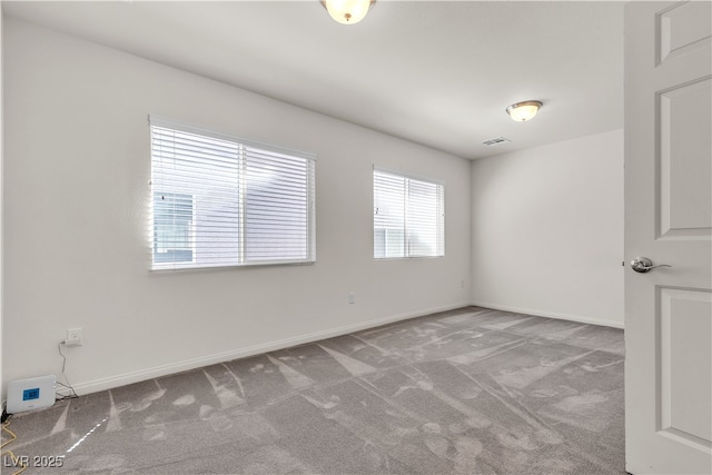 5661 Brimstone Hill Ave, Las Vegas, NV 89141 - carpeted empty room with baseboards