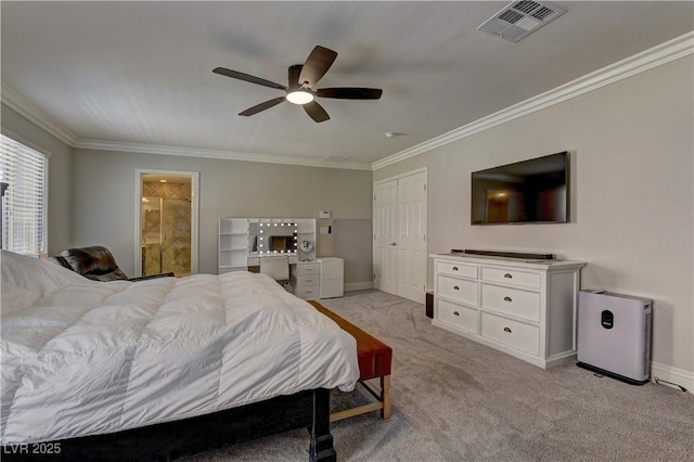 5635 Mesa Mountain Dr, Las Vegas, NV 89135 - bedroom with crown molding, baseboards, ceiling fan, light carpet, and ensuite bath