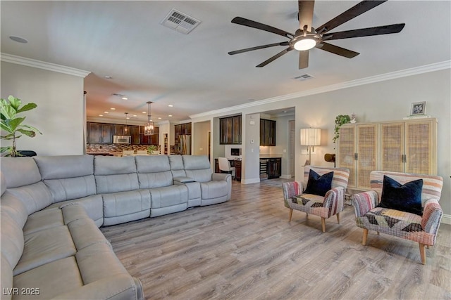 5635 Mesa Mountain Dr, Las Vegas, NV 89135 - living area featuring ornamental molding, ceiling fan, light wood-type flooring, recessed lighting, and baseboards