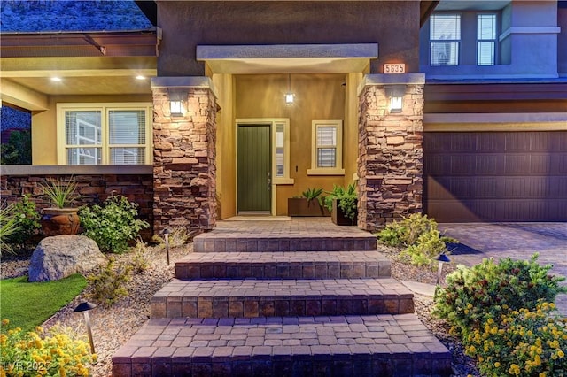 5635 Mesa Mountain Dr, Las Vegas, NV 89135 - entrance to property with stone siding, stucco siding, and a garage