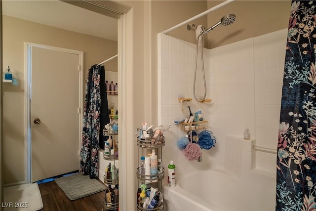 10049 Fragile Fields St, Las Vegas, NV 89183 - bathroom with shower / bath combo and wood finished floors