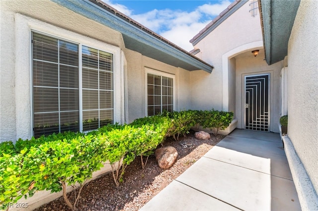 11405 Perugino Dr, Las Vegas, NV 89138 - doorway to property with stucco siding