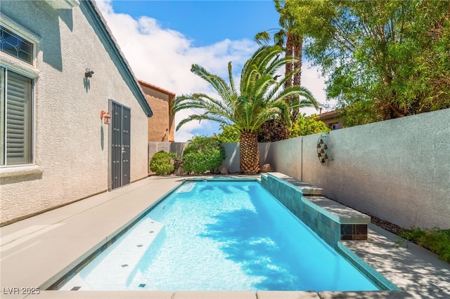 11405 Perugino Dr, Las Vegas, NV 89138 - view of pool featuring a fenced backyard