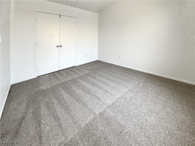 7900 Wood Shadow Ct, Las Vegas, NV 89131 - unfurnished bedroom featuring baseboards, a closet, and carpet floors