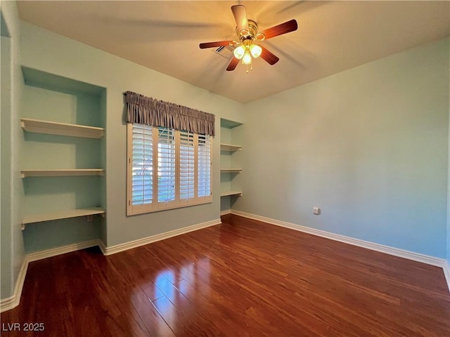 2343 Scotch Lake St, Las Vegas, NV 89134 - unfurnished room featuring wood finished floors, baseboards, ceiling fan, and built in shelves