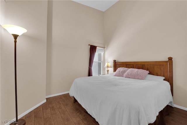 5000 Red Rock St Unit 259, Las Vegas, NV 89118 - bedroom featuring wood-type flooring and baseboards