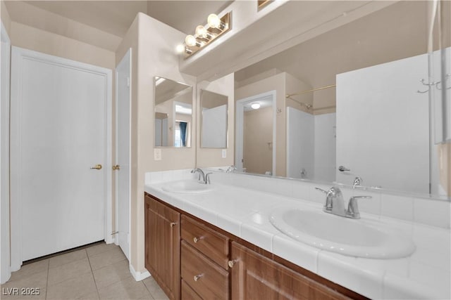 5000 Red Rock St Unit 259, Las Vegas, NV 89118 - bathroom featuring tile patterned flooring, double vanity, and a shower