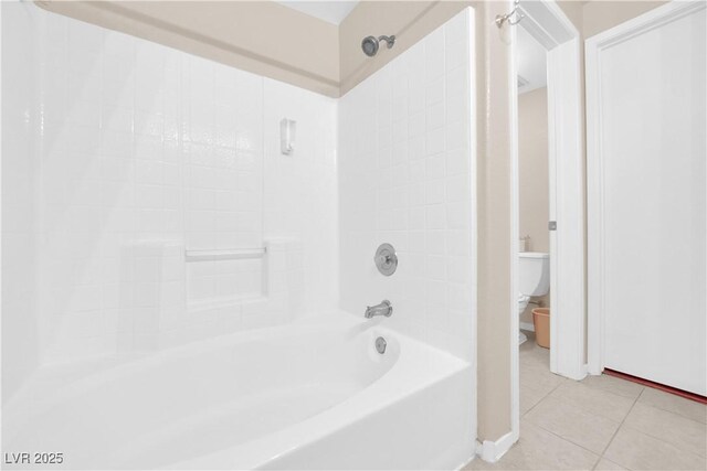 5000 Red Rock St Unit 259, Las Vegas, NV 89118 - bathroom featuring toilet, tile patterned floors, and shower / washtub combination