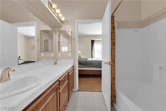 5000 Red Rock St Unit 259, Las Vegas, NV 89118 - full bathroom featuring ensuite bathroom, tile patterned flooring, double vanity, and shower / washtub combination