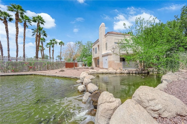 5000 Red Rock St Unit 259, Las Vegas, NV 89118 - water view with a small pond