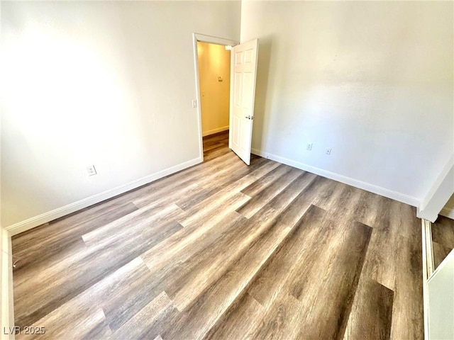 5250 S Rainbow Blvd Unit 2029, Las Vegas, NV 89118 - unfurnished room with wood finished floors and baseboards