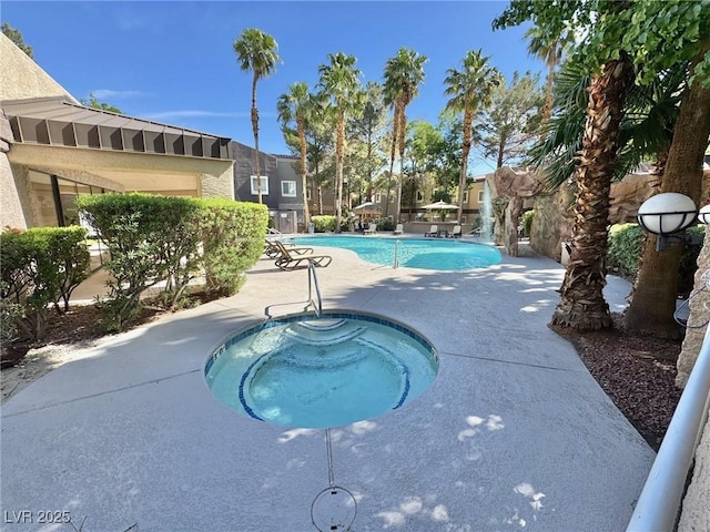 5250 S Rainbow Blvd Unit 2029, Las Vegas, NV 89118 - community pool featuring a hot tub and a patio area
