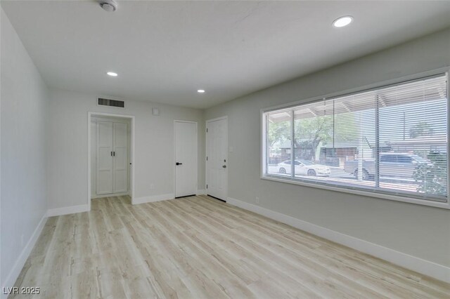 1825 Howard Ave, Las Vegas, NV 89104 - empty room featuring baseboards, light wood-style floors, and recessed lighting