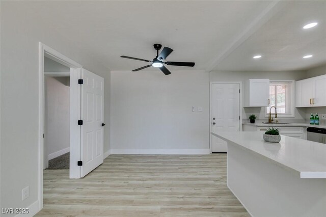 1825 Howard Ave, Las Vegas, NV 89104 - kitchen with a sink, white cabinets, light countertops, a ceiling fan, and recessed lighting