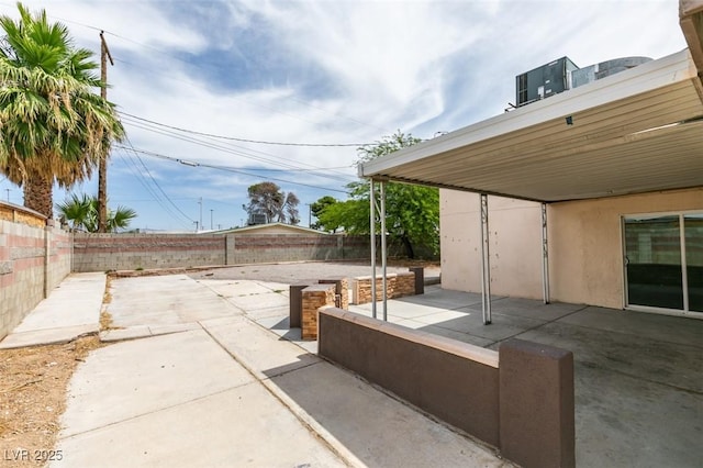1806 Renada Cir, North Las Vegas, NV 89030 - fenced backyard with a patio area