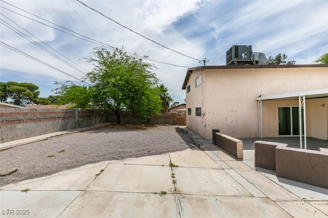 1806 Renada Cir, North Las Vegas, NV 89030 - fenced backyard featuring central AC and a patio