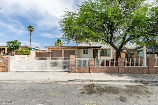 1806 Renada Cir, North Las Vegas, NV 89030 - view of front of property with a fenced front yard and concrete driveway