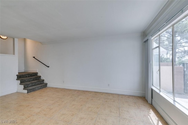 1806 Renada Cir, North Las Vegas, NV 89030 - spare room with stairway, crown molding, light tile patterned flooring, and baseboards