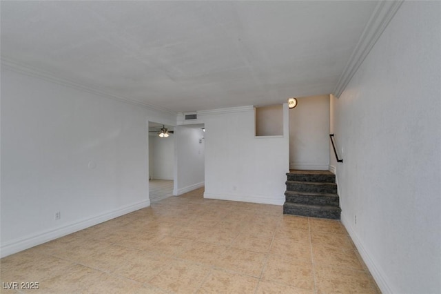 1806 Renada Cir, North Las Vegas, NV 89030 - unfurnished living room with crown molding, stairway, baseboards, and light tile patterned floors