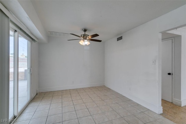 1806 Renada Cir, North Las Vegas, NV 89030 - empty room with a ceiling fan, light tile patterned flooring, and baseboards