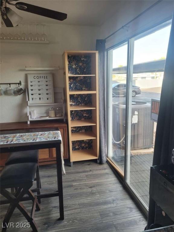 5335 Rod Ct Unit 102, Las Vegas, NV 89122 - wine area featuring a ceiling fan and wood finished floors
