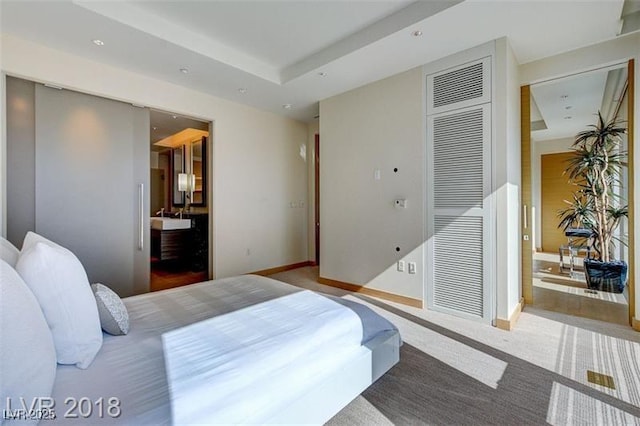 3750 S Las Vegas Blvd Unit 3111, Las Vegas, NV 89158 - carpeted bedroom with a closet, baseboards, and connected bathroom