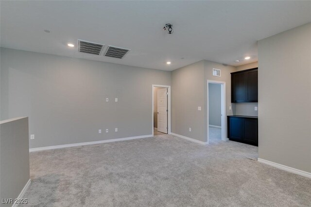 9239 Albus Hills Ave, Las Vegas, NV 89143 - spare room featuring recessed lighting, light carpet, and baseboards