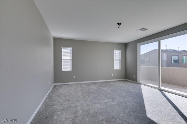 9239 Albus Hills Ave, Las Vegas, NV 89143 - spare room featuring carpet and baseboards