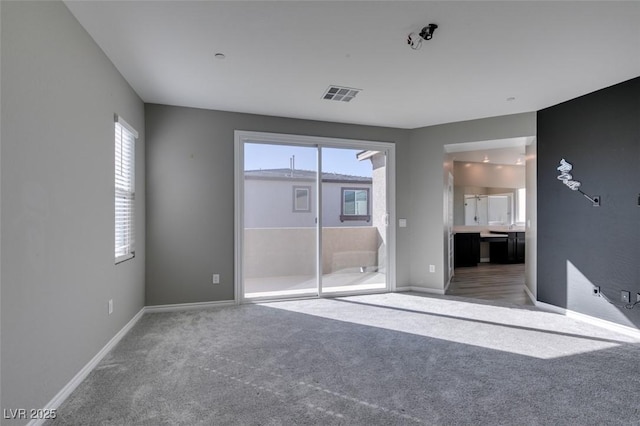 9239 Albus Hills Ave, Las Vegas, NV 89143 - unfurnished bedroom with carpet, access to outside, baseboards, and connected bathroom