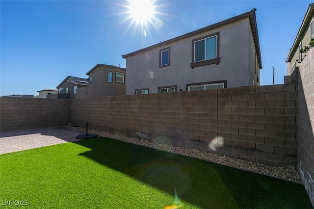 9239 Albus Hills Ave, Las Vegas, NV 89143 - view of yard featuring a patio