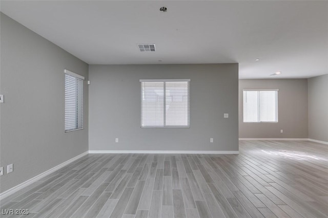 9239 Albus Hills Ave, Las Vegas, NV 89143 - unfurnished room featuring light wood-style floors and baseboards