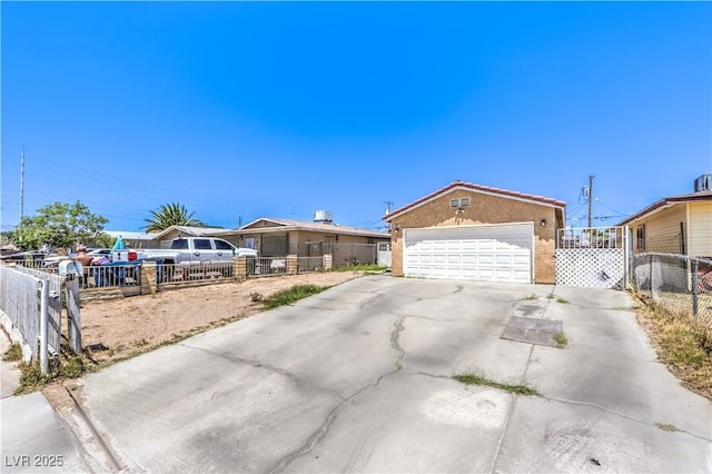844 Balzar Ave, Las Vegas, NV 89106 - view of front of home with a detached garage and stucco siding