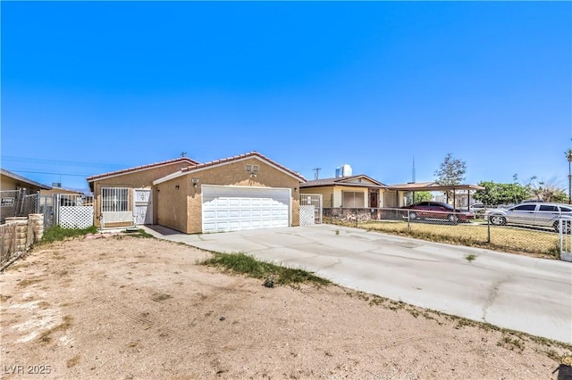 844 Balzar Ave, Las Vegas, NV 89106 - view of front of house with a garage, driveway, and stucco siding
