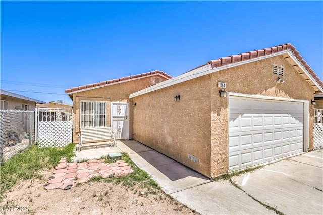 844 Balzar Ave, Las Vegas, NV 89106 - view of front of home featuring stucco siding and a tile roof