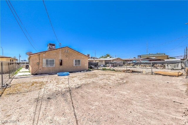844 Balzar Ave, Las Vegas, NV 89106 - rear view of property with central AC unit