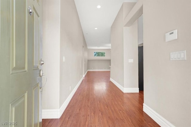 1212 E Rome Blvd, North Las Vegas, NV 89086 - hall with wood finished floors, baseboards, and recessed lighting