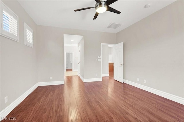 1212 E Rome Blvd, North Las Vegas, NV 89086 - empty room featuring ceiling fan, wood finished floors, baseboards, and a smoke detector