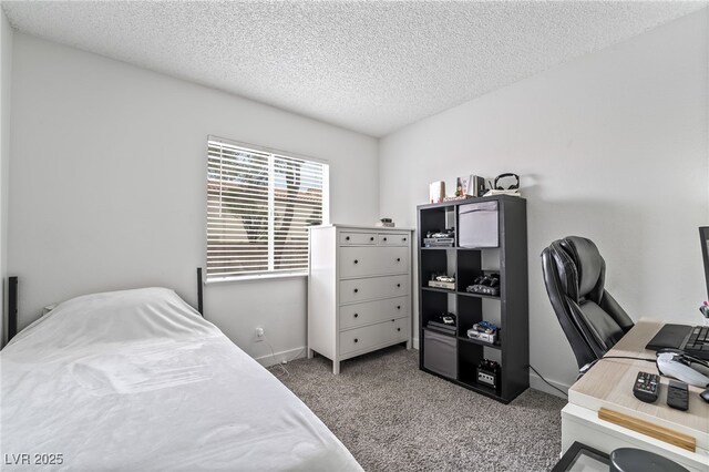 2507 Albemarle Way, Henderson, NV 89014 - bedroom featuring carpet, a textured ceiling, and a desk