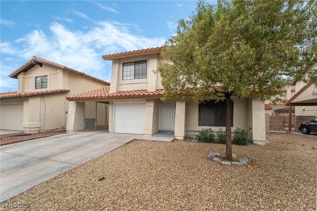 2507 Albemarle Way, Henderson, NV 89014 - mediterranean / spanish-style house with stucco siding, concrete driveway, an attached garage, and a tile roof
