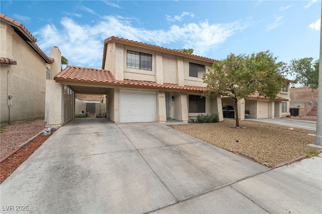 2507 Albemarle Way, Henderson, NV 89014 - view of front of property with driveway, stucco siding, central AC, a tile roof, and a garage